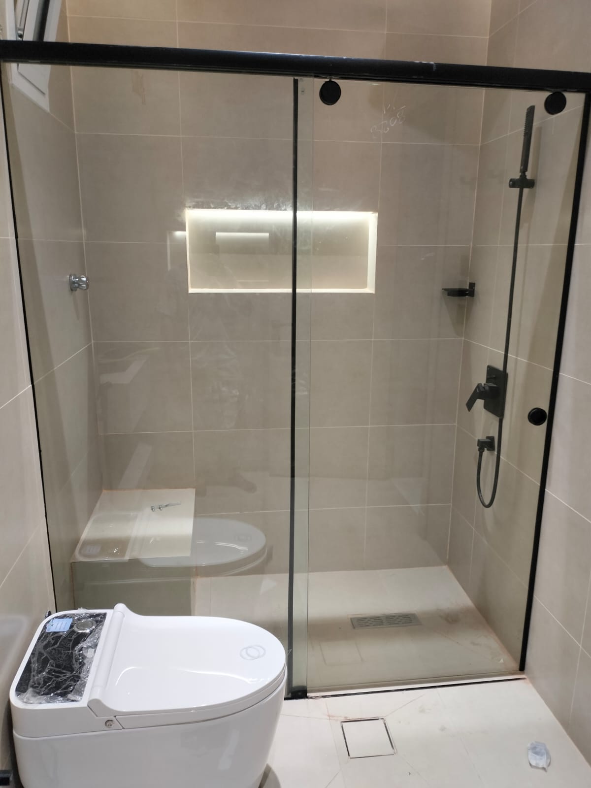 Modern glass door with vertical black accents
